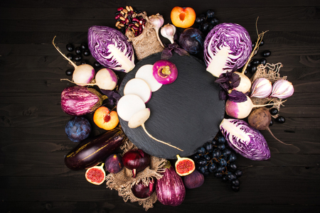 Purple vegetables on a wooden backgroundの写真素材