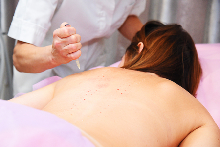 Beauty injections in the salon. The procedure for skin tightening and rejuvenation.の写真素材