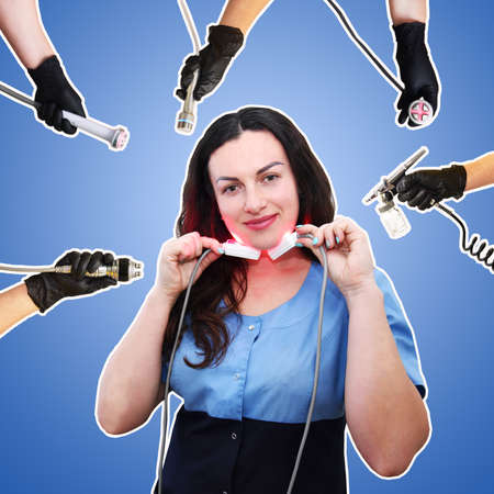 A woman beautician against the background of a collage of handpieces for carrying out hardware...