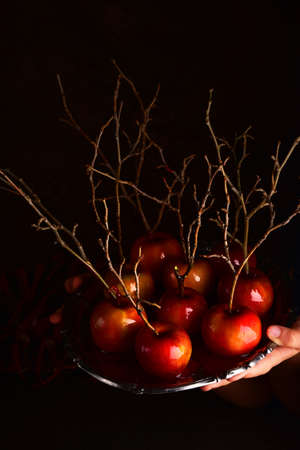 Still life with food for halloween. Sweets, apples, candies.の写真素材