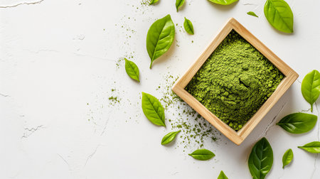 instant matcha green tea in wood bowl on a white backgroundの素材