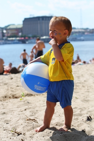 Swede boy-fan is in the fan camping site on the Trukhanov Island 19, 2012 in Kiev, Ukraine.のeditorial素材