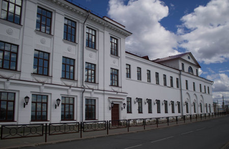 An old house on the embankment on a sunny dayの写真素材