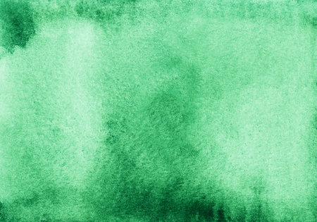 Watercolor light emerald ombre background texture. Aquarelle abstract pastel green gradient backdrop. textured paper.の写真素材
