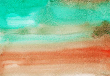 Watercolor light green and orange background painting texture. Multicolored watercolor liquid backdrop. Brush strokes on paper.の写真素材