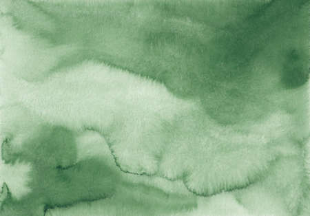 Abstract green watercolor background texture with copy space, stains on paper. Aquarelle painting wallpaper.の写真素材