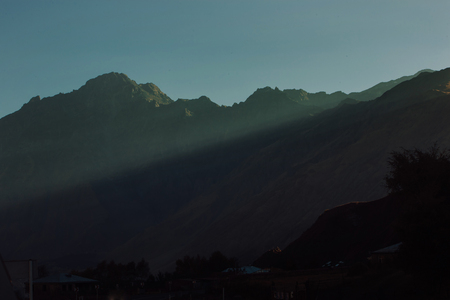 beautiful mountain and city landscape. light and shadow. the texture of the rocksの写真素材