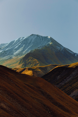 beautiful mountain and city landscape. light and shadow. the texture of the rocksの写真素材
