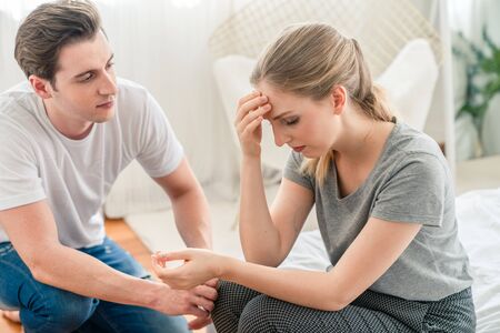 Young couple having trouble in relationship man try to reconcile with his girlfriend