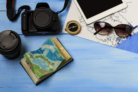 Overhead view of traveler's accessories. Travel concept background. Essential vacation items, tourism mockup. Space for textの写真素材