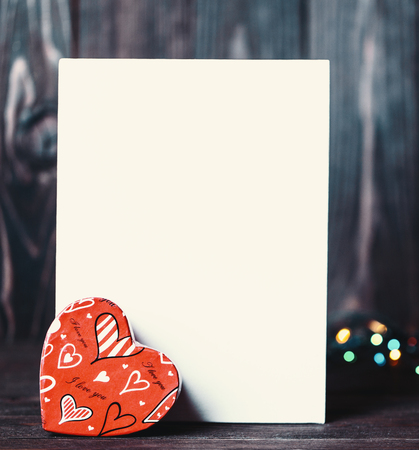 Valentine. Love. Valentine's Day vintage postcard. Love concept for mother's day and valentine's day. Happy Valentine's day hearts on a wooden backgroundの写真素材