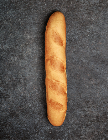 Fresh bread on table. Homemade bread. Kitchen or bakery poster design. Bread backgroundの写真素材