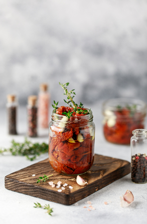 Dried sour cream in the glass jar. Top view. Print for kitchenの写真素材