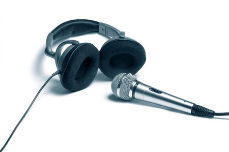Microphone and headphones isolated on whiteの写真素材