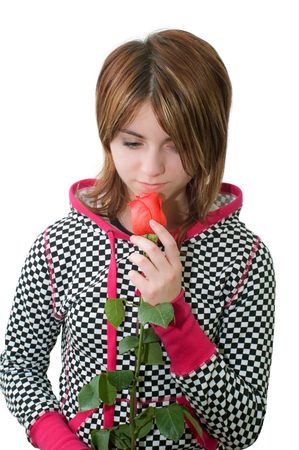 Young sorrowful girl with roseの写真素材