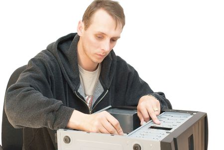 Technician repairing PC isolated on whiteの写真素材