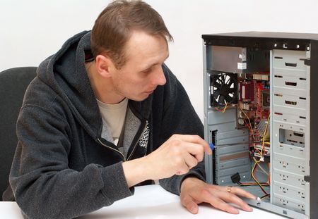 Technician repairing PC の写真素材