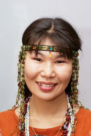 Beautiful chukchi woman in the folk dressの写真素材