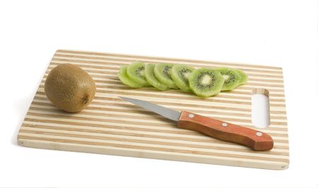 Kiwi fruit (whole and slices) isolated on whiteの写真素材
