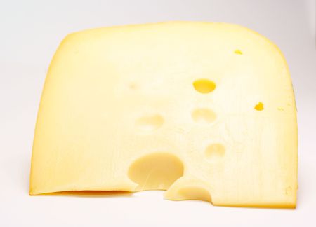 A piece of cheese closeupの写真素材