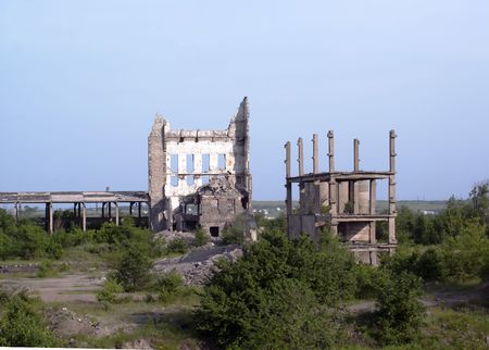 Carcass of old ruined factoryの写真素材