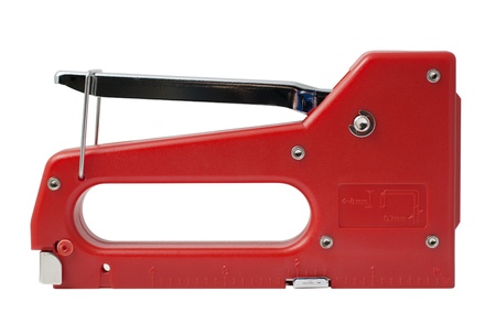 Red stapler close-up isolated on white backgroundの写真素材