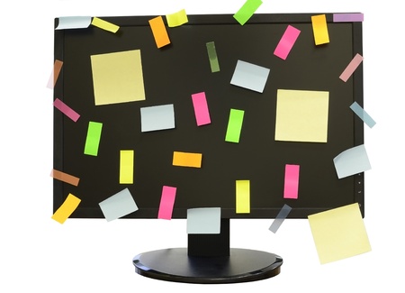 Many stickers on the screen of monitorの写真素材