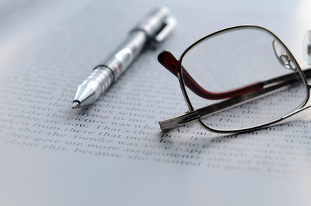 Book, glasses and penの写真素材