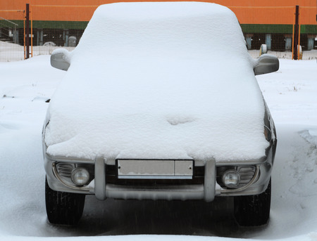 Snow covered carの写真素材