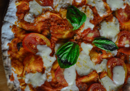 close up wood fired tomato pizza Margherita vegetarian foodの写真素材
