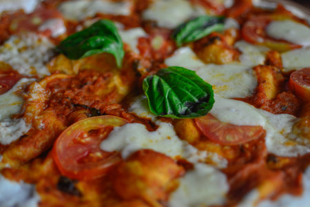 close up wood fired tomato pizza Margherita vegetarian foodの写真素材