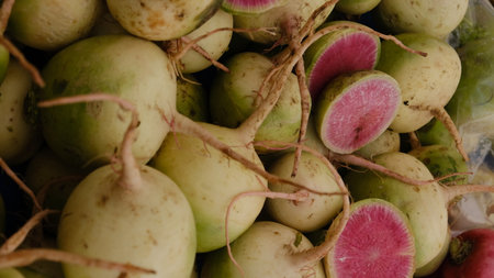 Organic turnip pink inside on the village market. View from aboveの写真素材