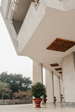 This contemporary architecture showcases unique overhangs complemented beautifully by lush and...