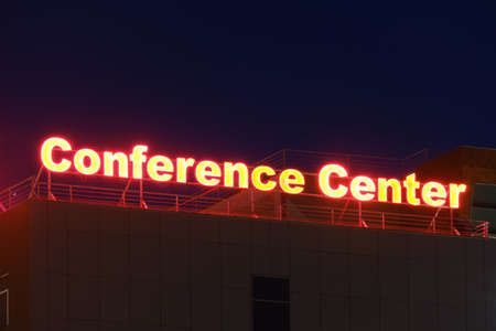 Conference Center sign on top of RIN Grand Hotel building at night, near Vitan, in Bucharest,...