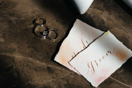 Accessories for the bride: rings and shoesの写真素材