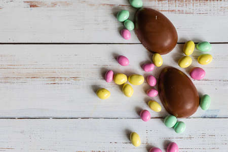 Chocolate Easter Eggs Over Wooden Backgroundの写真素材