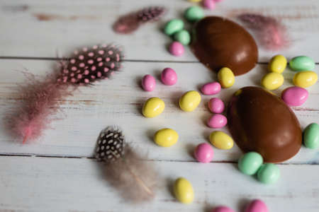 Chocolate Easter Eggs Over Wooden Backgroundの写真素材