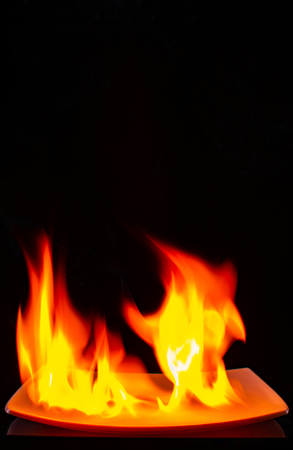 burning flame on a colored backgroundの写真素材