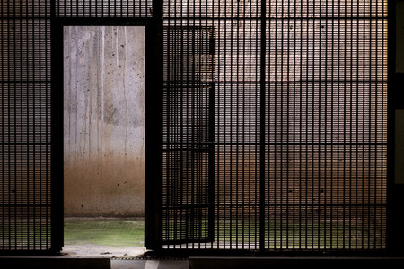 grided door in parking basementの写真素材