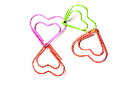 Heart shaped paper clips connected to each other in a circleの写真素材