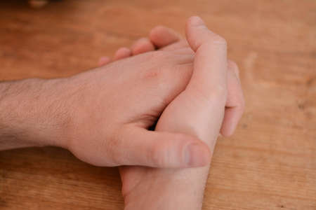 The gesture of friendship and peace from the hands. A friendly handshake.の写真素材