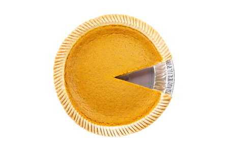 Top View - Fresh delicious pumpkin pie with piece missing on white background ( Isolated pie dessert pumpkin, sweet potato)の写真素材