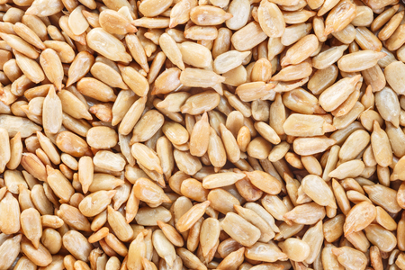 Peeled Sunflower Seeds Texture As Background. Top view.の写真素材