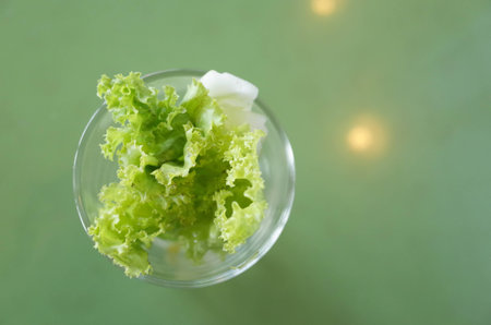 Vegetables in the glass on the table.の素材