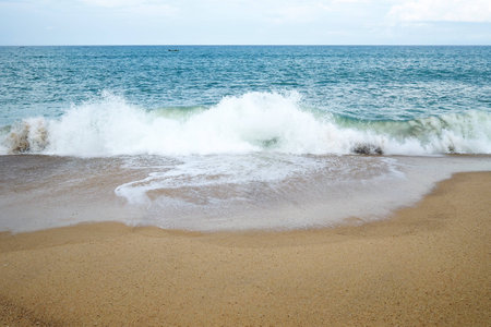 wave on the beach on sunny day.の写真素材