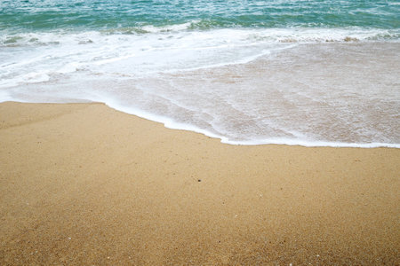 wave on the beach on sunny day.の写真素材
