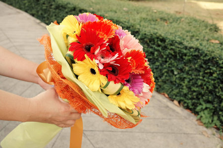 congratulation with bouquet of flowers.の写真素材