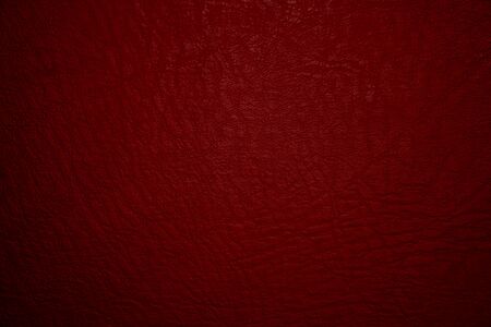 Dark red leather material texture, useful as background for design-worksの写真素材