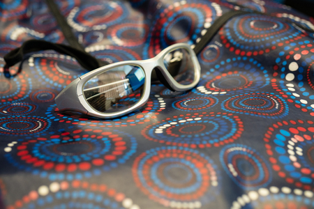 A pair of radiation protection glasses and gownの写真素材