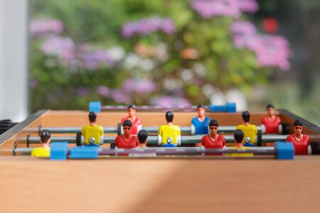 Small table football game in a game room.の写真素材